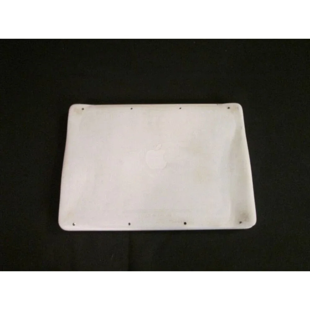 White Macbook With Keyboard Skin
